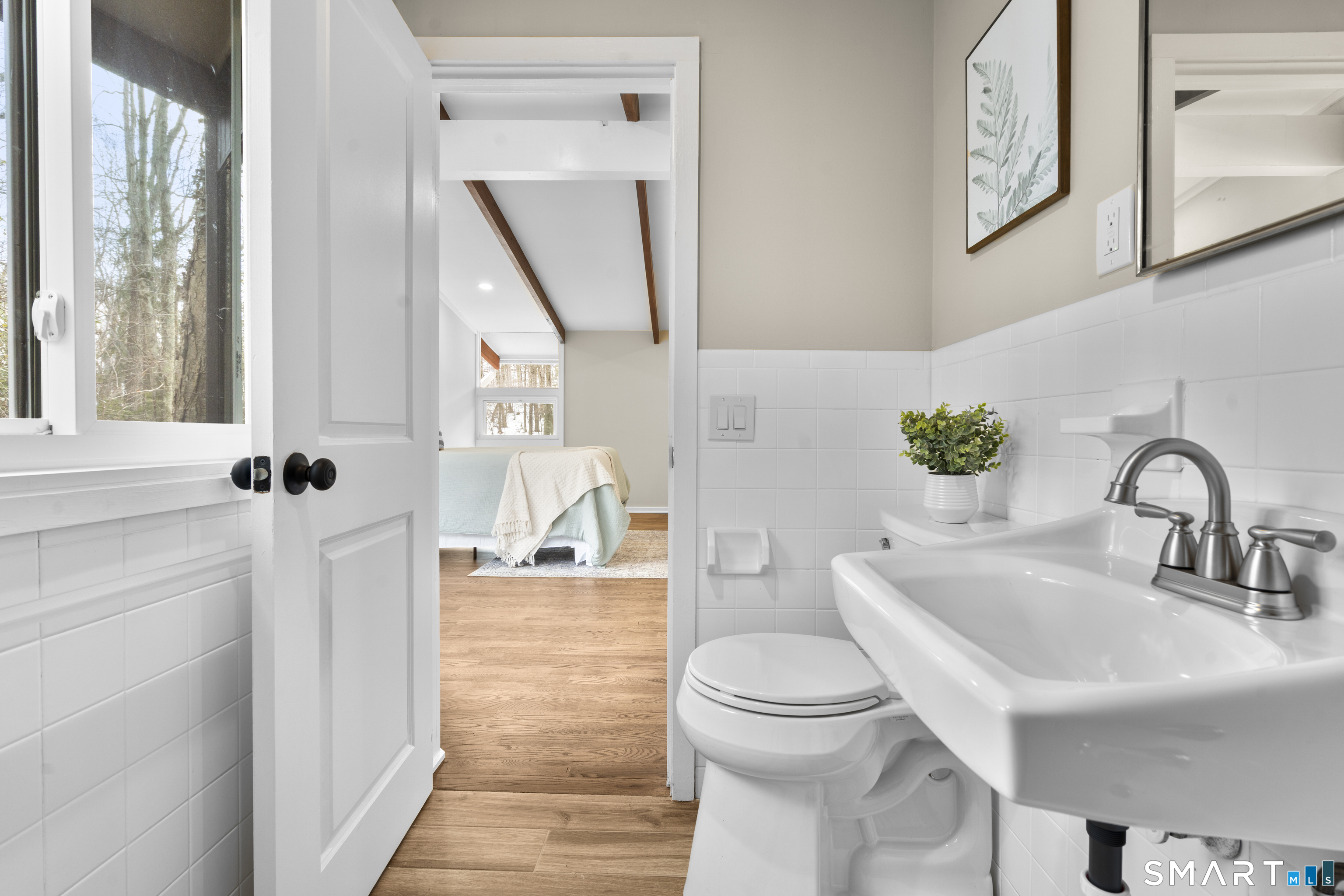 143 Gaylord Mountain Road Bethany, CT 06524 - Photo 16 of 30 a bathroom with a sink a toilet and shower