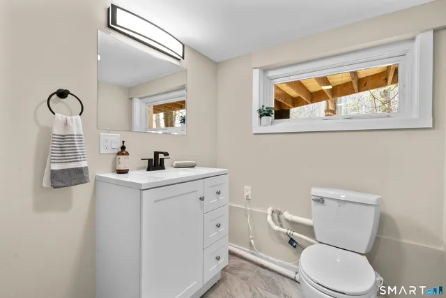 a view of a backyard of the house