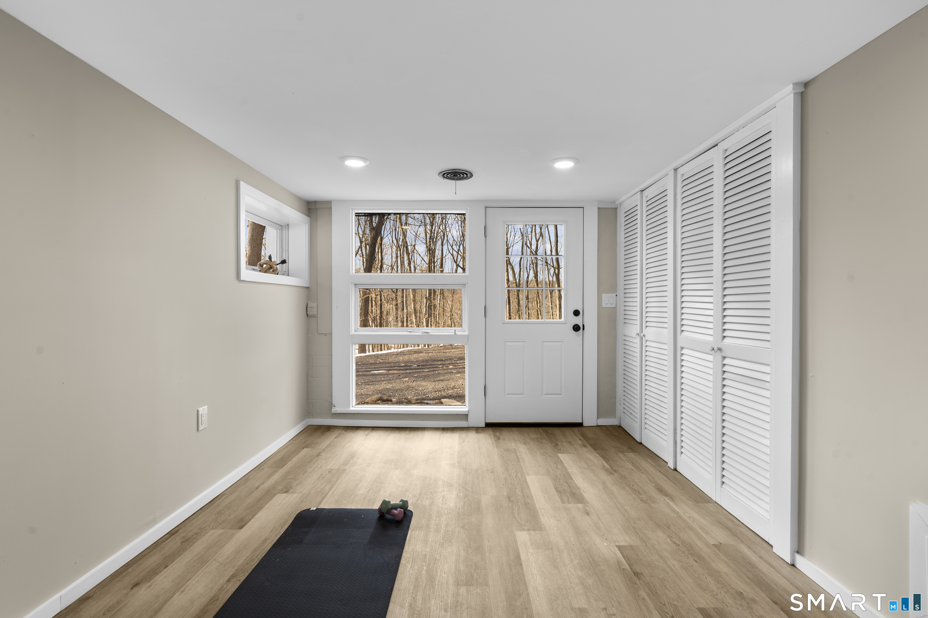 143 Gaylord Mountain Road Bethany, CT 06524 - Photo 23 of 30 wooden floor in an empty room with a window