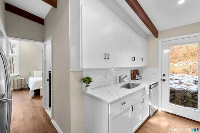 a view of a livingroom with a fireplace