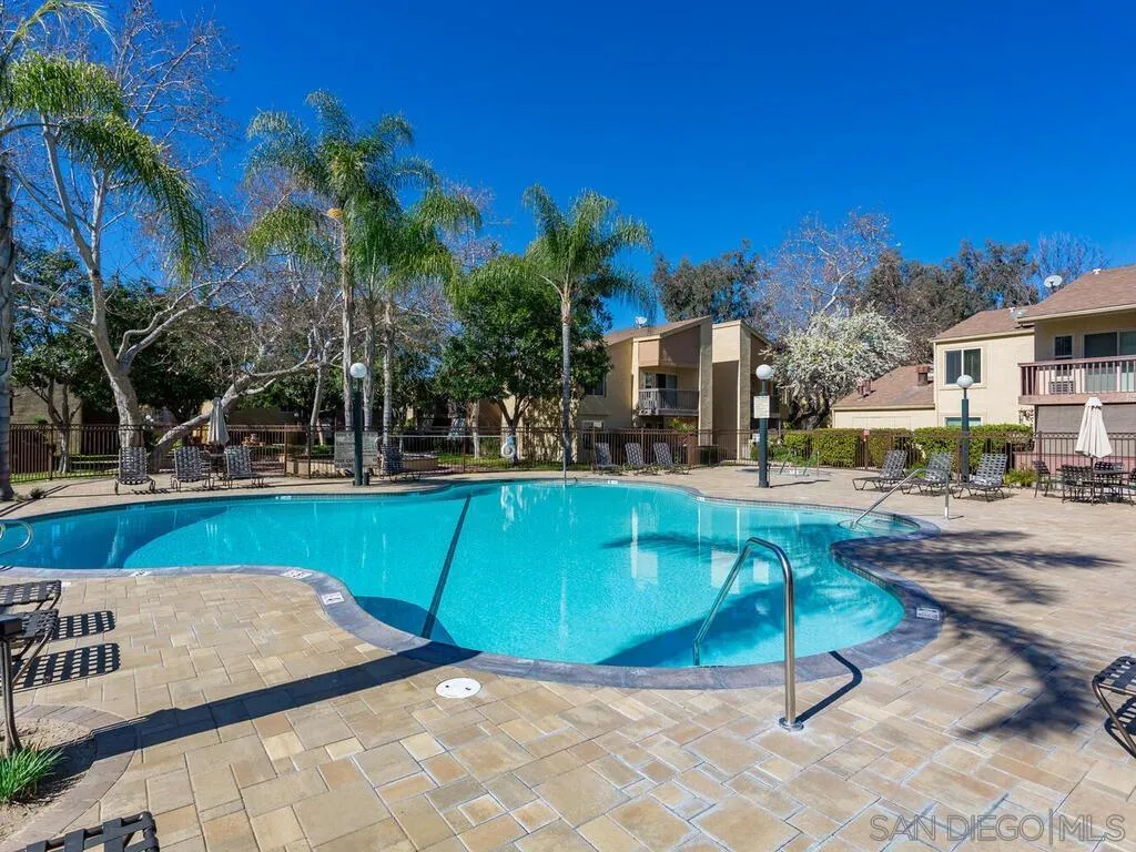 5950 Rancho Mission Road, Unit 166 San Diego, CA 92108 - Photo 14 of 18 a view of a yard with a slide