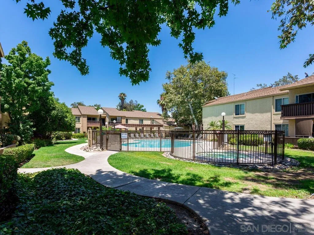 5950 Rancho Mission Road, Unit 166 San Diego, CA 92108 - Photo 4 of 18 a view of a house with a yard porch and sitting area