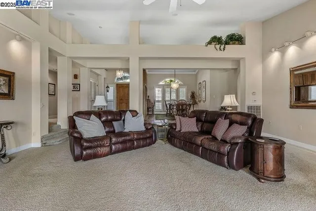 a kitchen with stainless steel appliances granite countertop a stove and a refrigerator