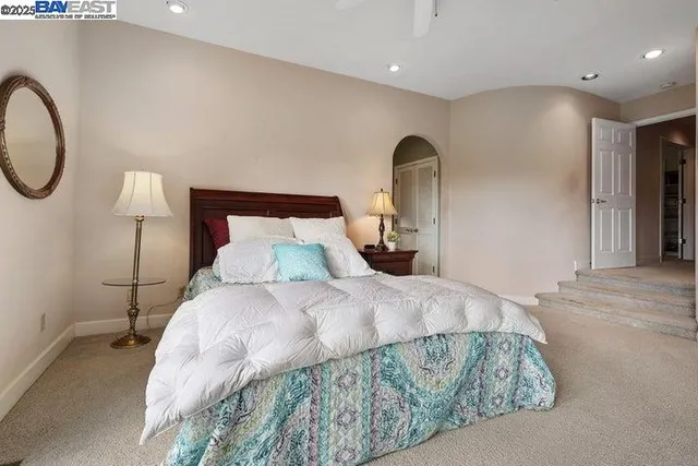 a view of a porch with furniture and wooden floor