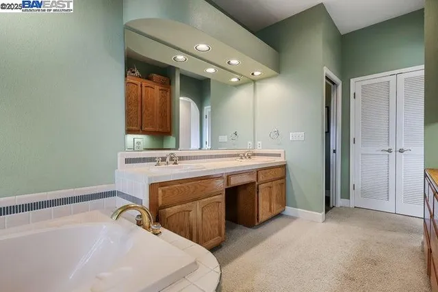 a view of a street with a garden