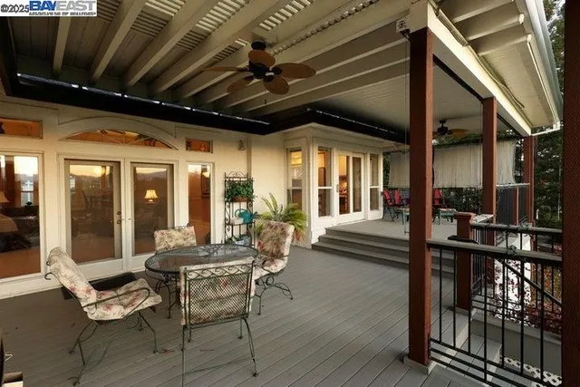 a front view of a house with a garden and yard