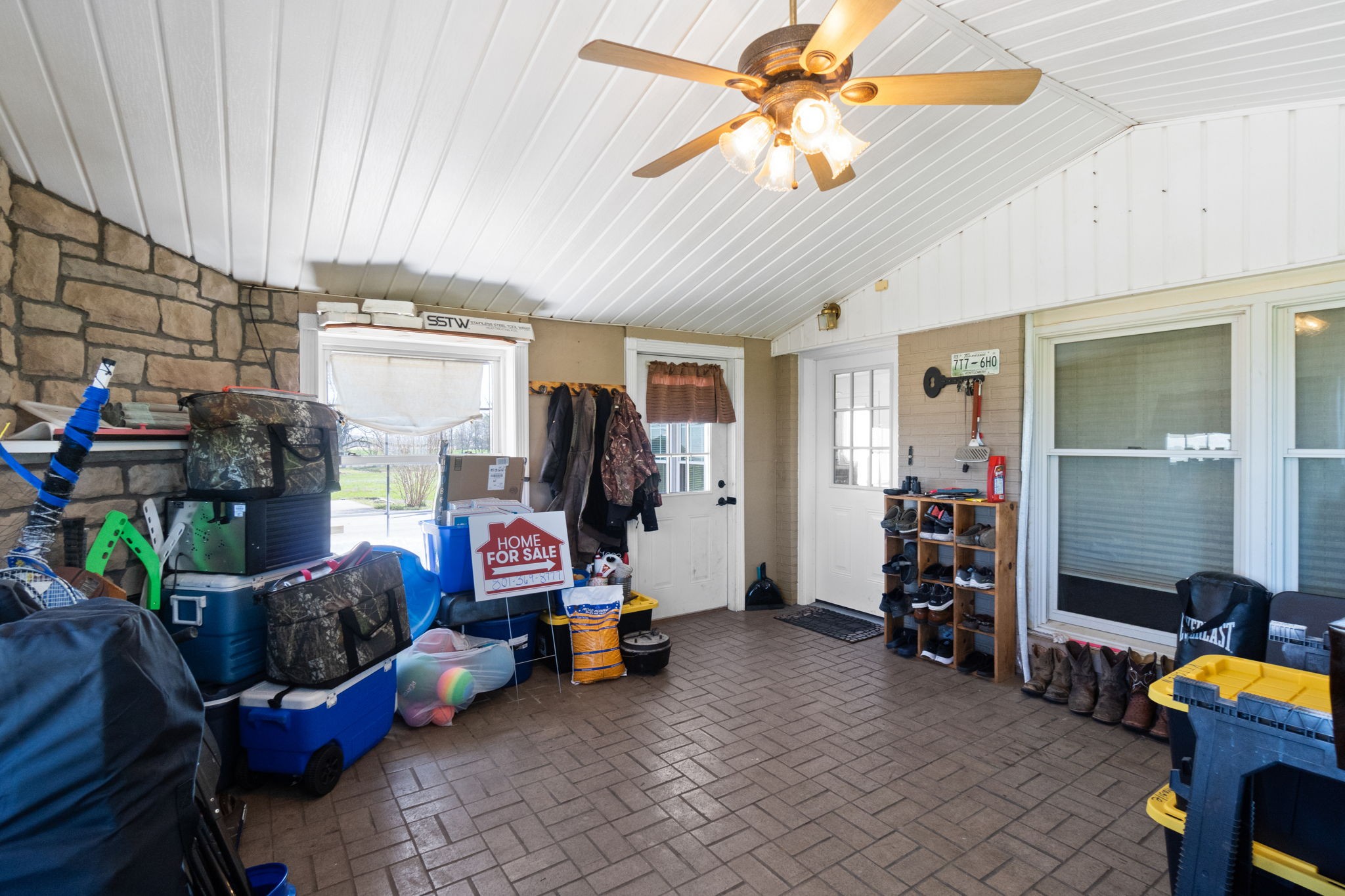 5150 Cadiz Road Hopkinsville, KY 42240 - Photo 35 of 45 a living room with furniture and a flat screen tv