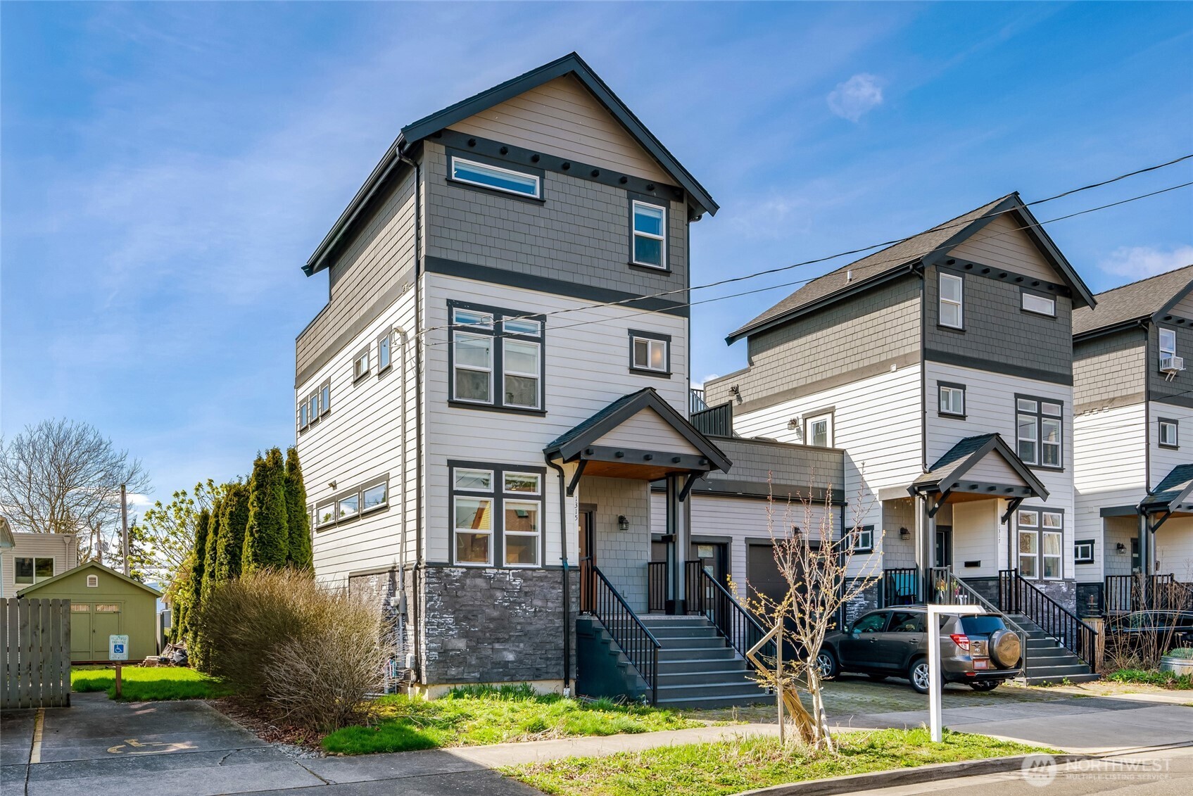 1315 Astor Street Bellingham, WA 98225 - Photo 2 of 34 a front view of a house with garden