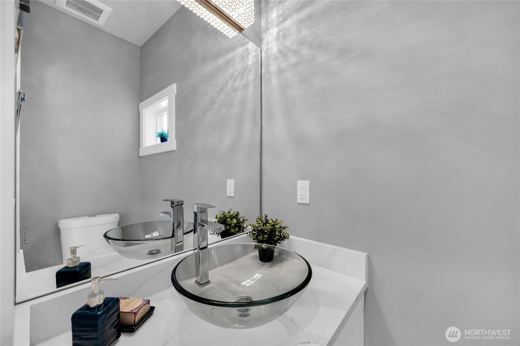 1315 Astor Street Bellingham, WA 98225 - Photo 10 of 34 a bathroom with a sink and a mirror