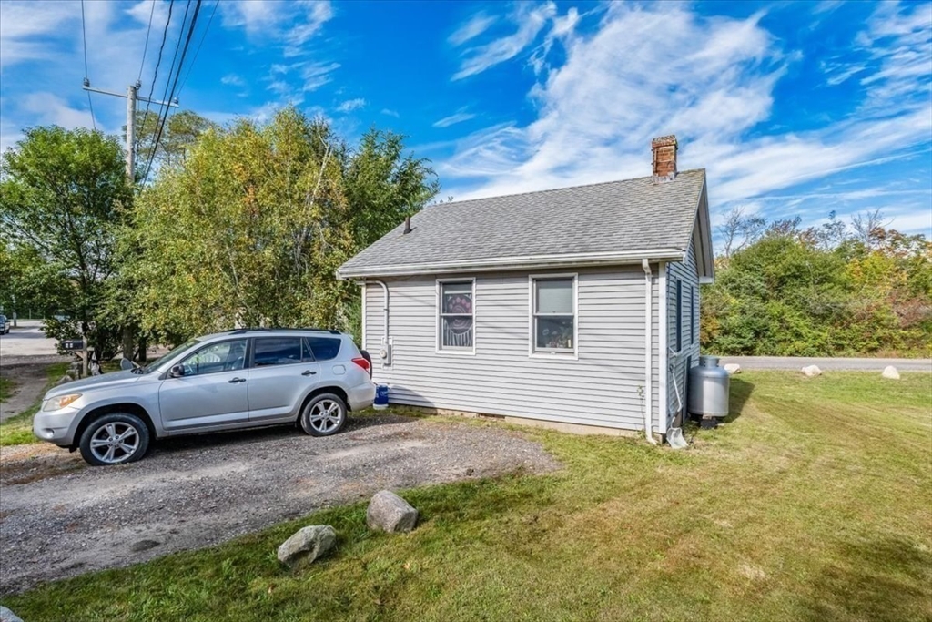 70 Hedge Road Plymouth, MA 02360 - Photo 35 of 41 a car parked in front of a house
