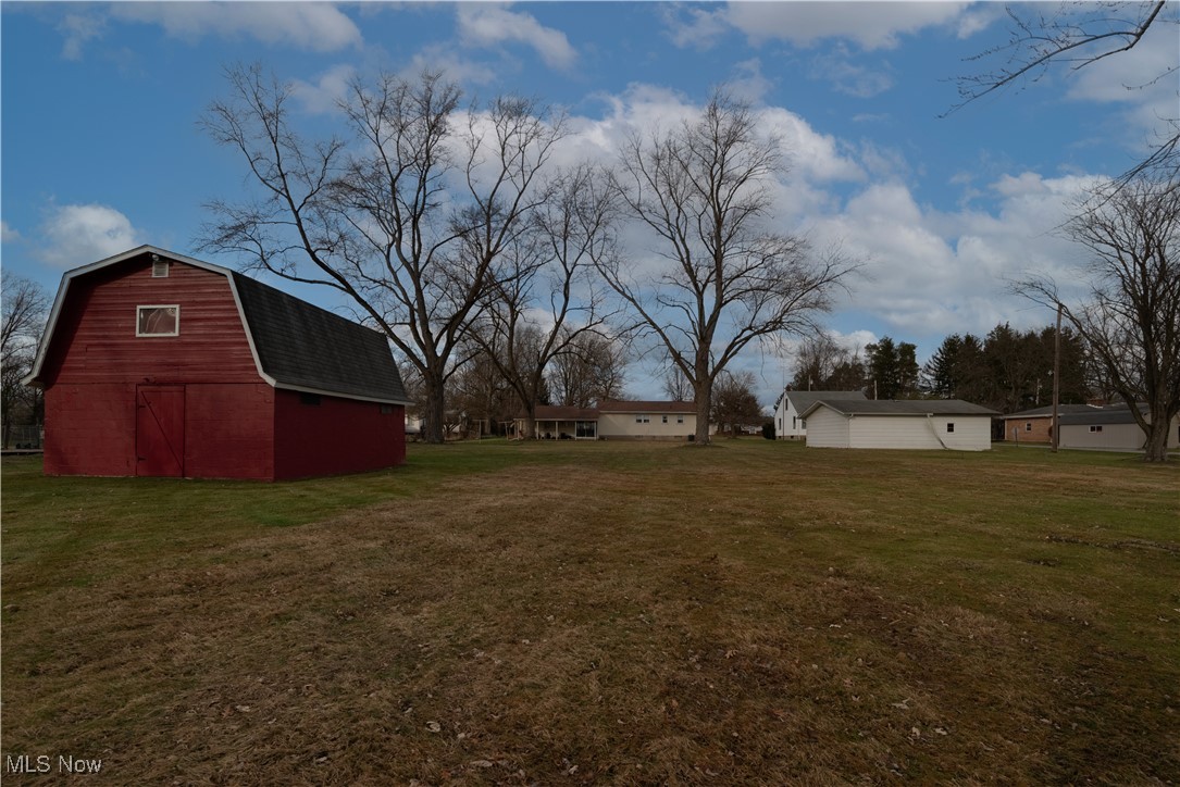 376 Johnson Plank Road Warren, OH 44481 - Photo 26 of 28 View of grassy yard with barn.