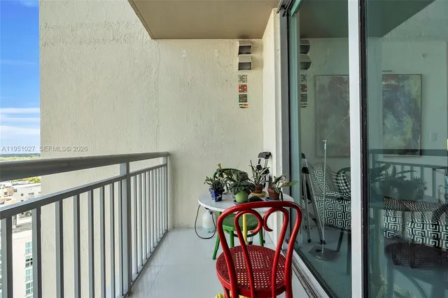 a view of city with tall buildings