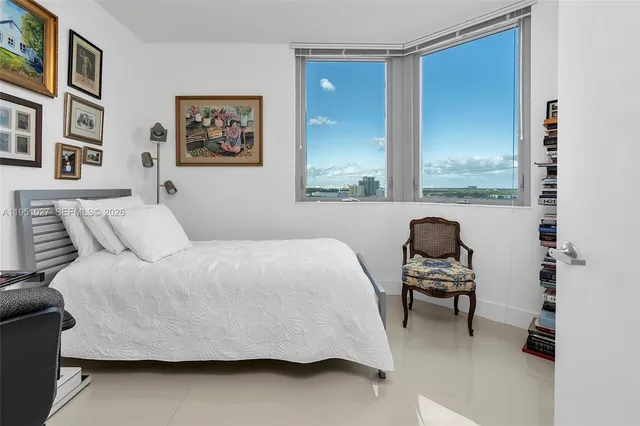 a bedroom with furniture and a bed