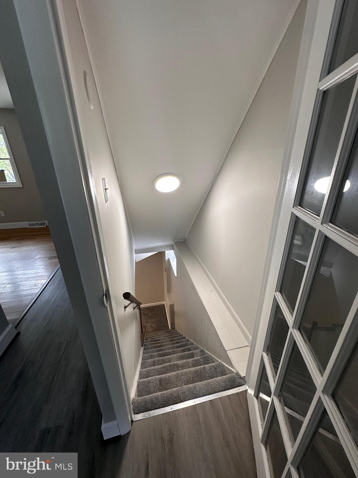 8543 Summit Road Pasadena, MD 21122 - Photo 26 of 37 Basement stairs view from kitchen