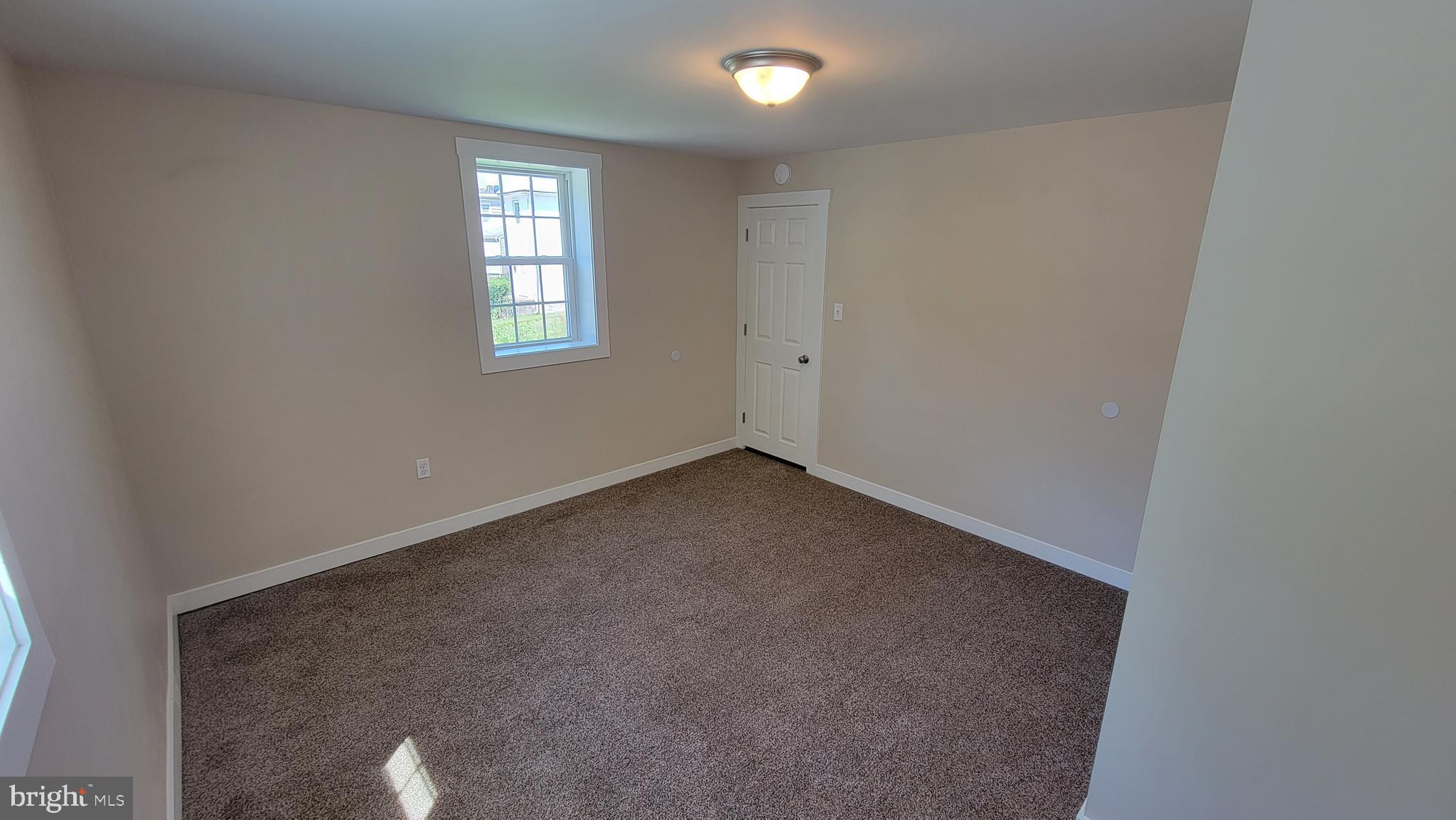 222 State Street Enola, PA 17025 - Photo 22 of 42 an empty room with windows