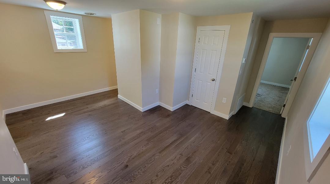 222 State Street Enola, PA 17025 - Photo 24 of 42 an empty room with wooden floor and windows