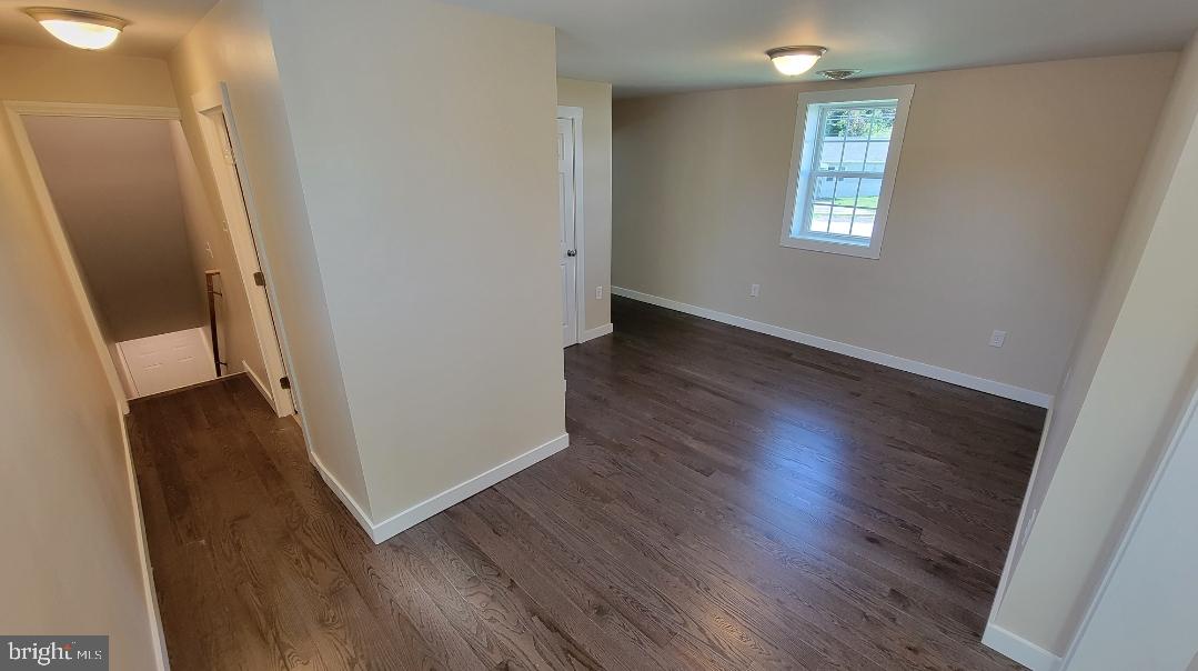 222 State Street Enola, PA 17025 - Photo 25 of 42 a view of a hallway with wooden floor and a window