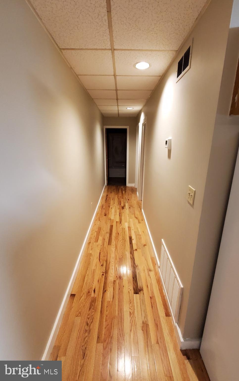222 State Street Enola, PA 17025 - Photo 4 of 42 a view of a hallway with wooden floor