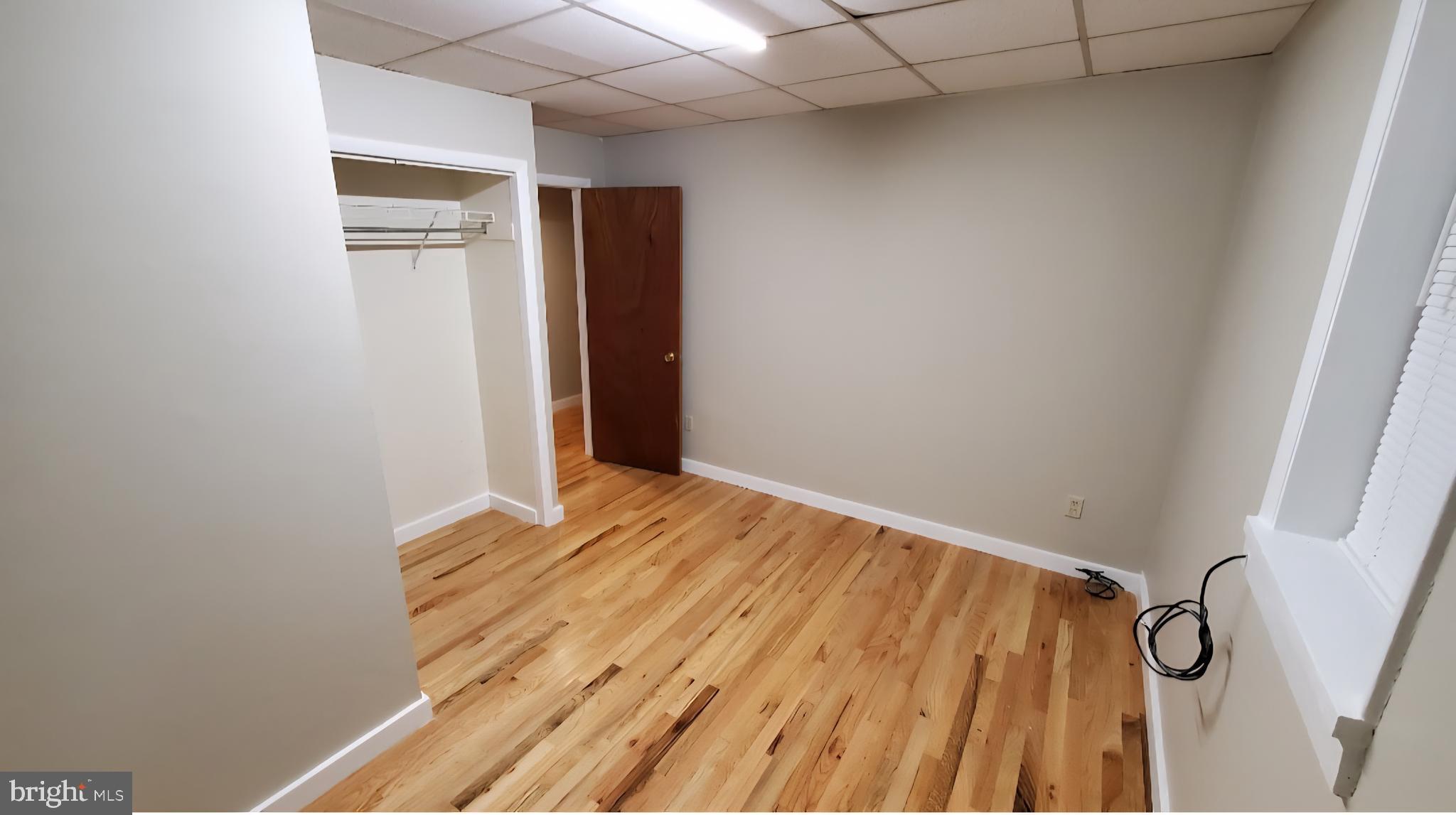 222 State Street Enola, PA 17025 - Photo 6 of 42 a view of a room with wooden floor and bathroom