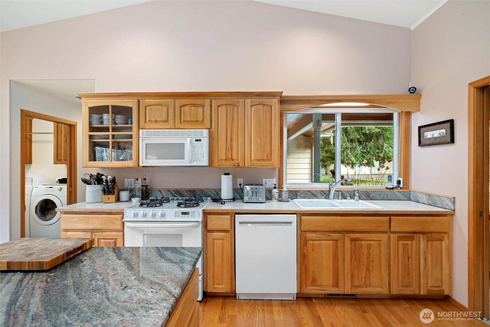 6170 Rutsatz Road Deming, WA 98244 - Photo 11 of 40 a kitchen with a sink stove and cabinets