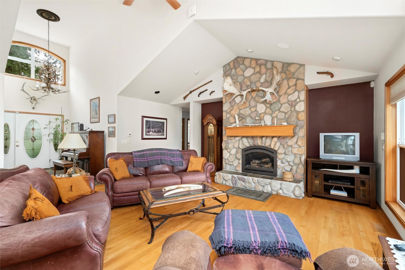6170 Rutsatz Road Deming, WA 98244 - Photo 5 of 40 a living room with furniture and a fireplace