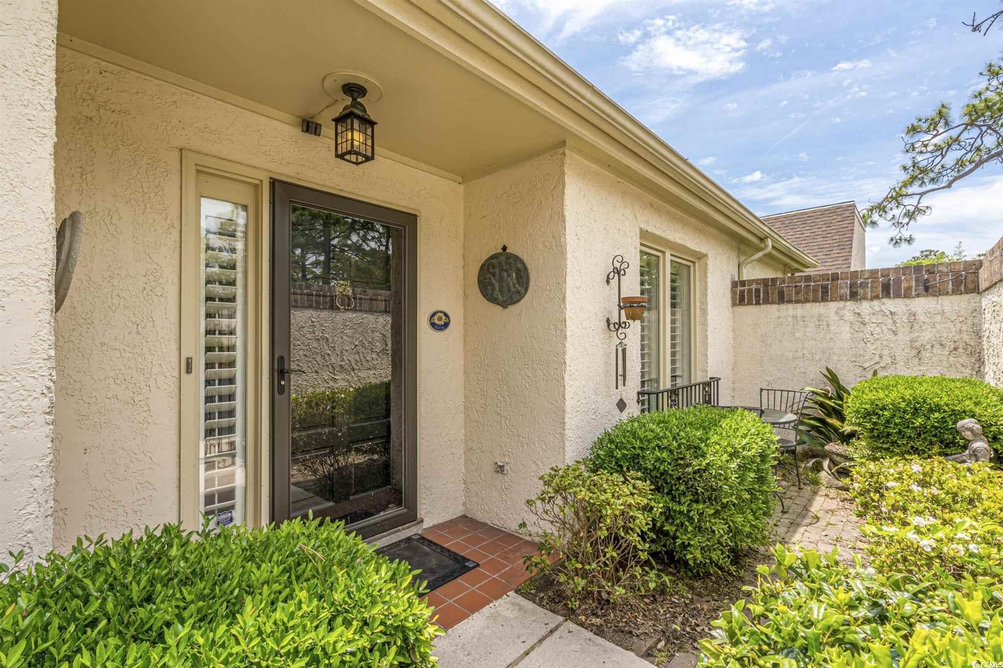 5 San Marks Court Myrtle Beach, SC 29572 - Photo 31 of 42 Property entrance featuring stucco siding