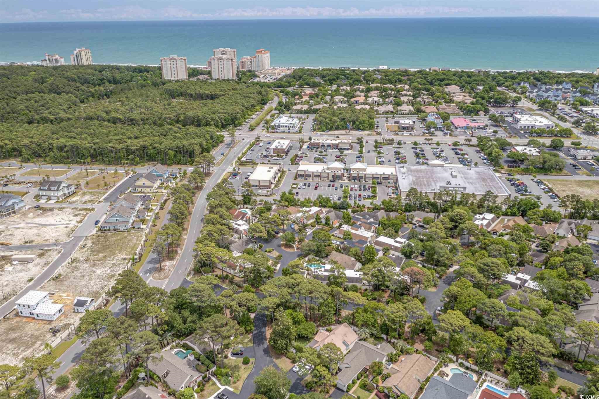 5 San Marks Court Myrtle Beach, SC 29572 - Photo 40 of 42 Aerial view of property's location with a large body of water and nearby suburban area