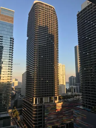 a view of a city with tall buildings