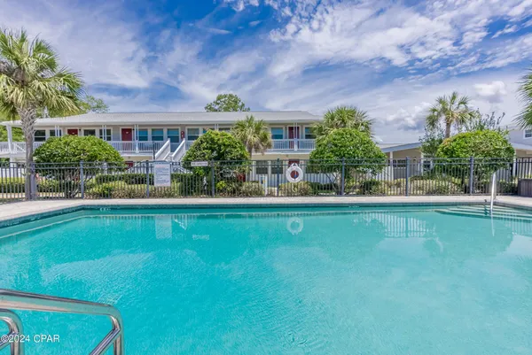 a view of a swimming pool with a patio
