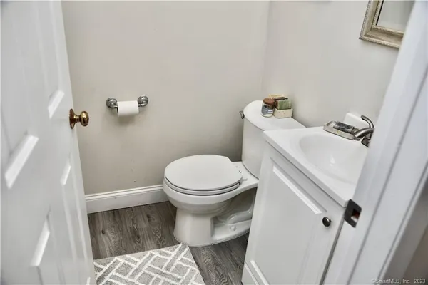 a bathroom with a toilet and a sink