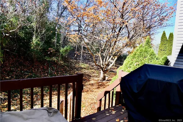 a view of balcony with furniture