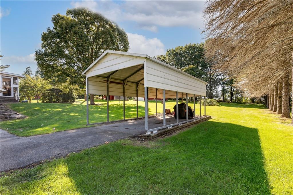 320 Holyoke Road Butler, PA 16001 - Photo 15 of 15 a view of a house with a backyard porch and sitting area