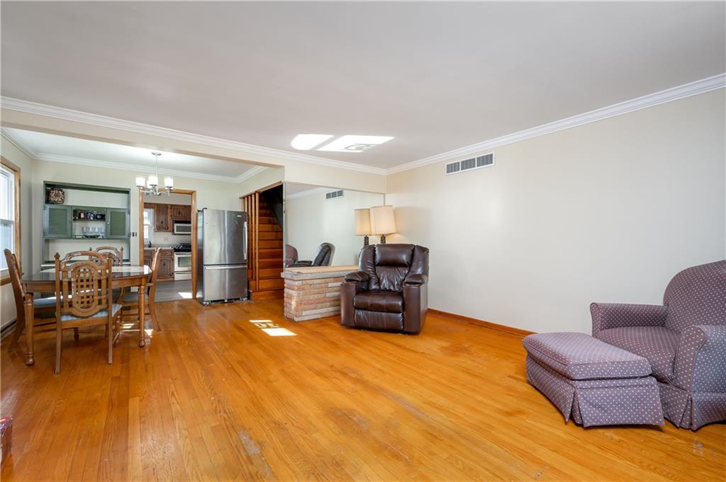 320 Holyoke Road Butler, PA 16001 - Photo 4 of 15 a living room with furniture and a wooden floor