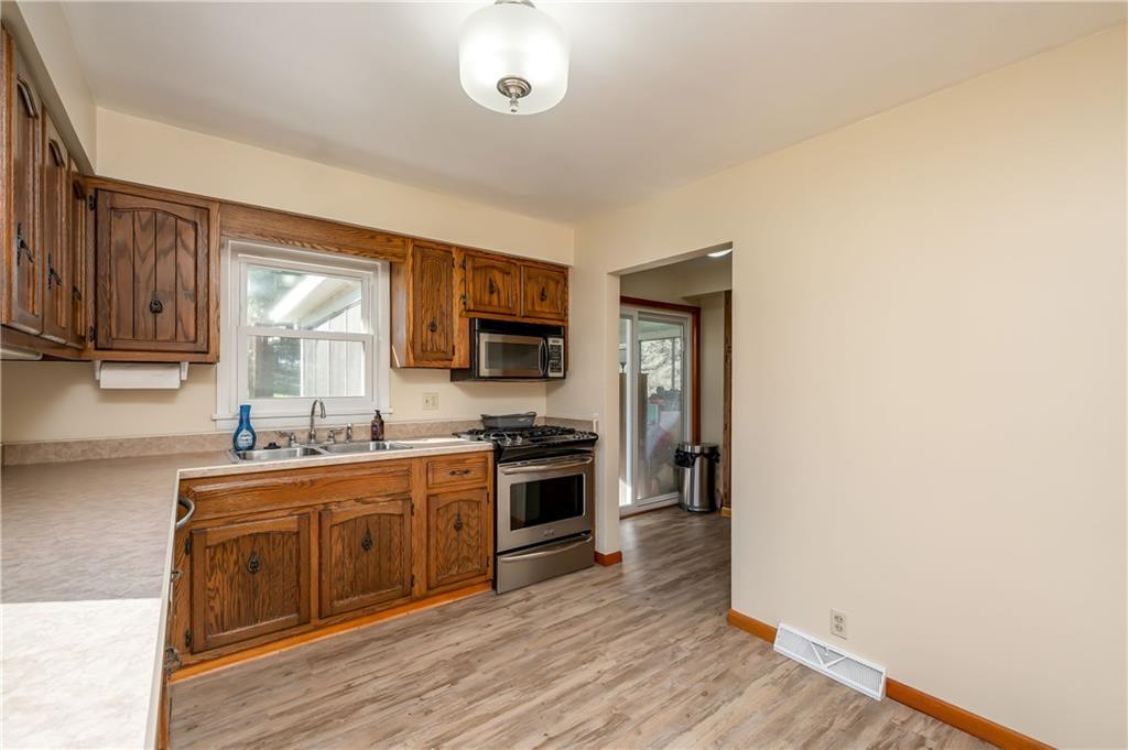 320 Holyoke Road Butler, PA 16001 - Photo 7 of 15 a kitchen with stainless steel appliances a stove top oven a sink and dishwasher