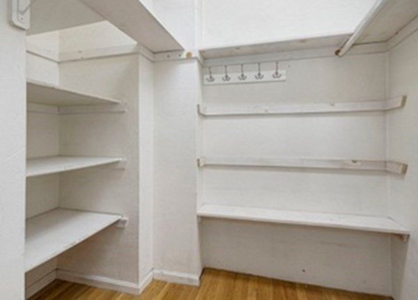 a bathroom with a granite countertop sink a vanity and a mirror