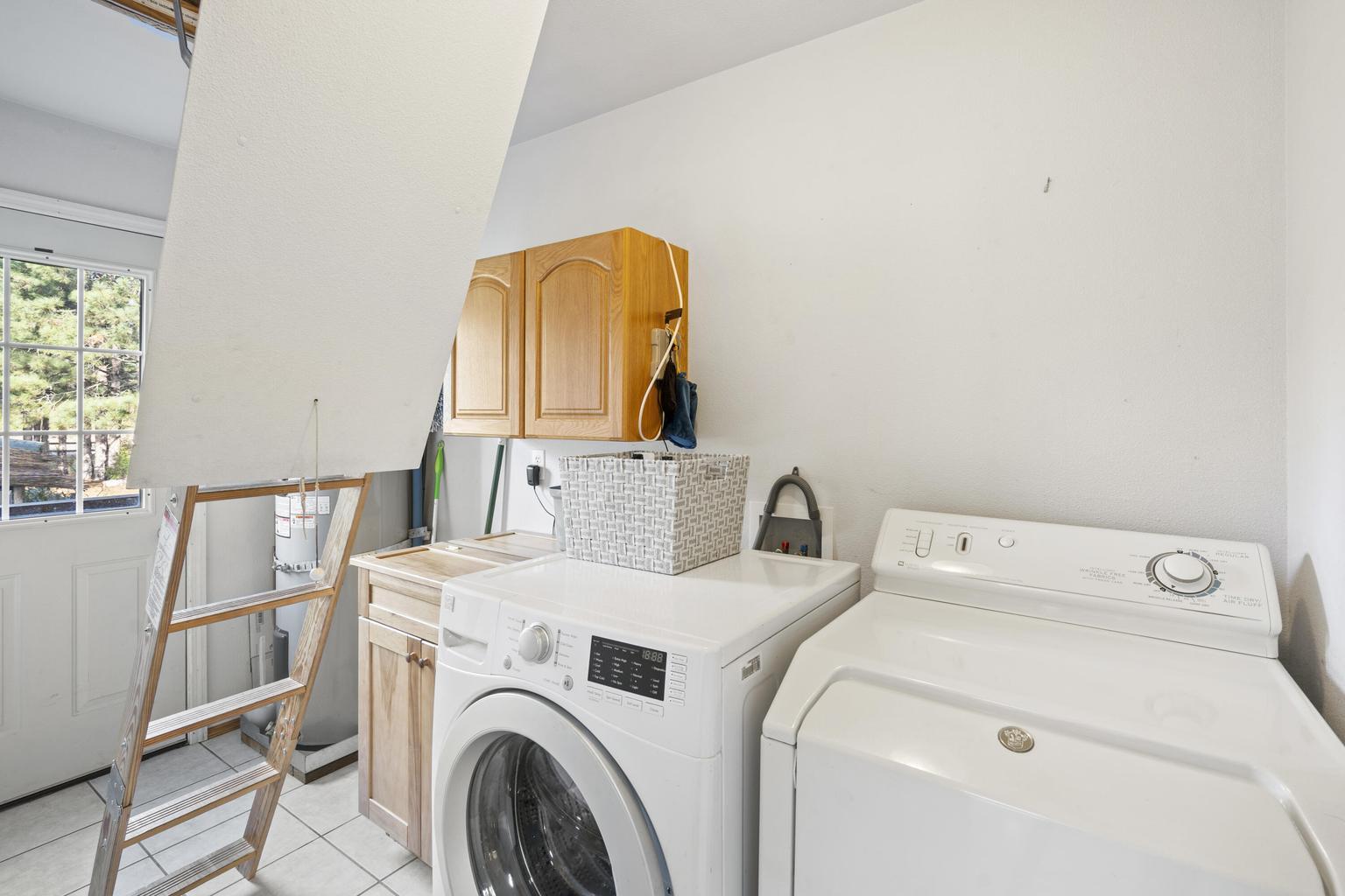 1190 Cedar Flat Road Williams, OR 97544 - Photo 21 of 45 a utility room with dryer and washer