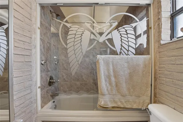 a bathroom with a bathtub