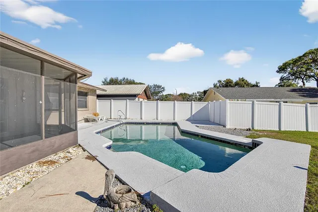 a view of a house with swimming pool
