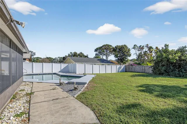 a view of a house with a swimming pool