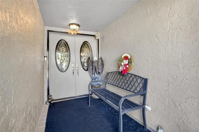 a view of a hallway with entryway