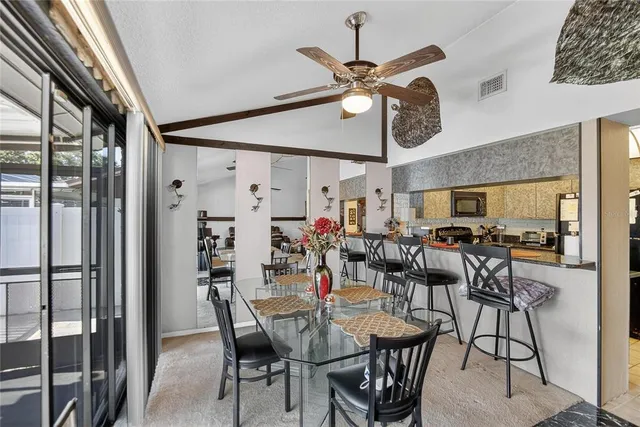 a view of a dining room and livingroom view