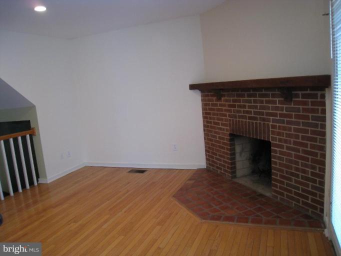 1602 Apricot Court Reston, VA 20190 - Photo 4 of 10 Family Room w/Fireplace
