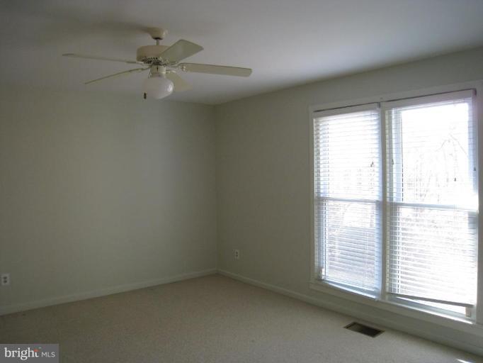 1602 Apricot Court Reston, VA 20190 - Photo 7 of 10 Master Bedroom w/Ceiling Fan