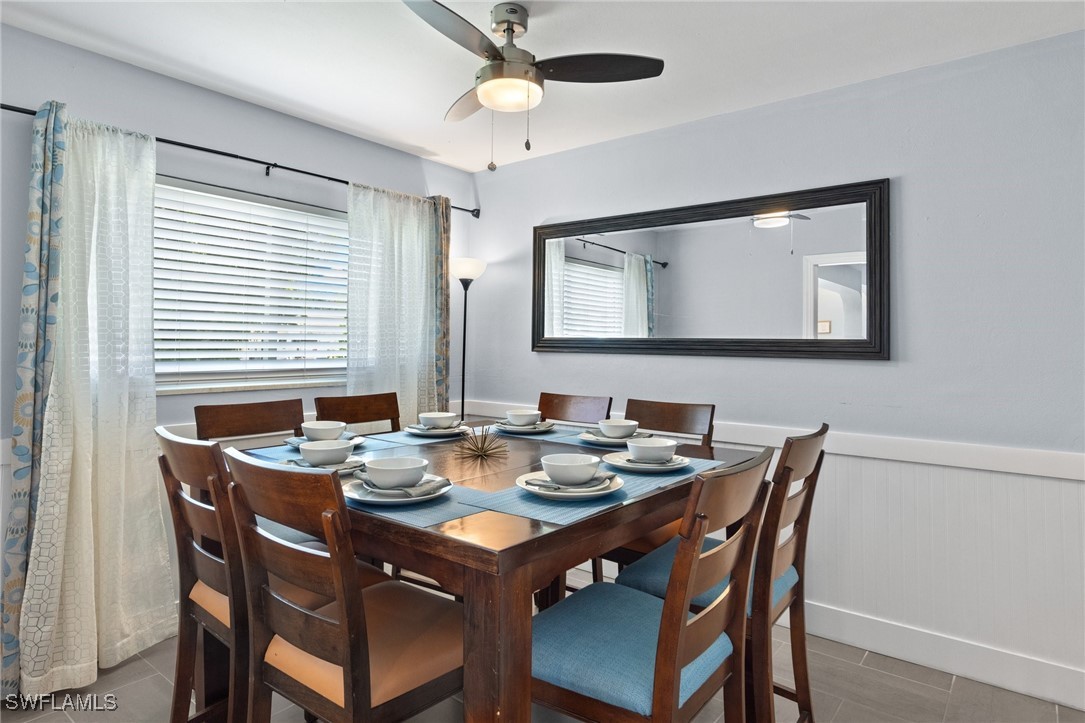 5216 Rutland Court Cape Coral, FL 33904 - Photo 22 of 47 a dining room with furniture and window