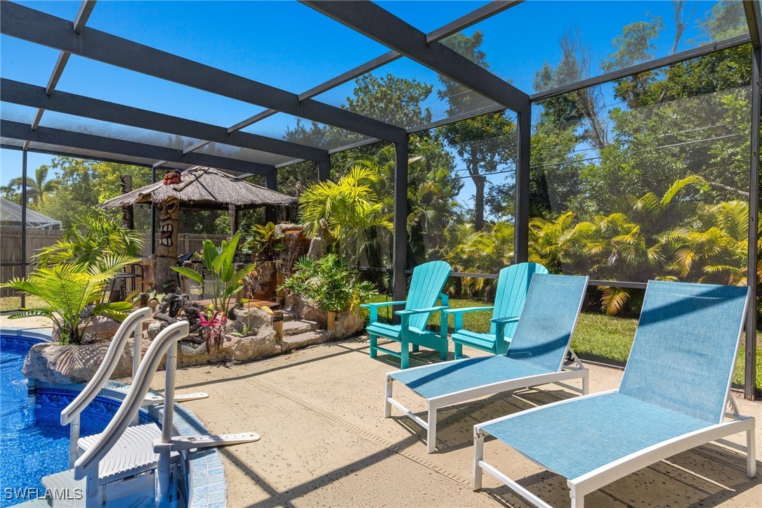 5216 Rutland Court Cape Coral, FL 33904 - Photo 33 of 47 a view of an outdoor sitting area with furniture