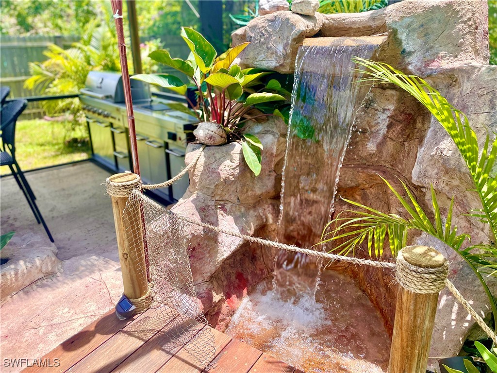 5216 Rutland Court Cape Coral, FL 33904 - Photo 4 of 47 a vase of flowers sitting on a table