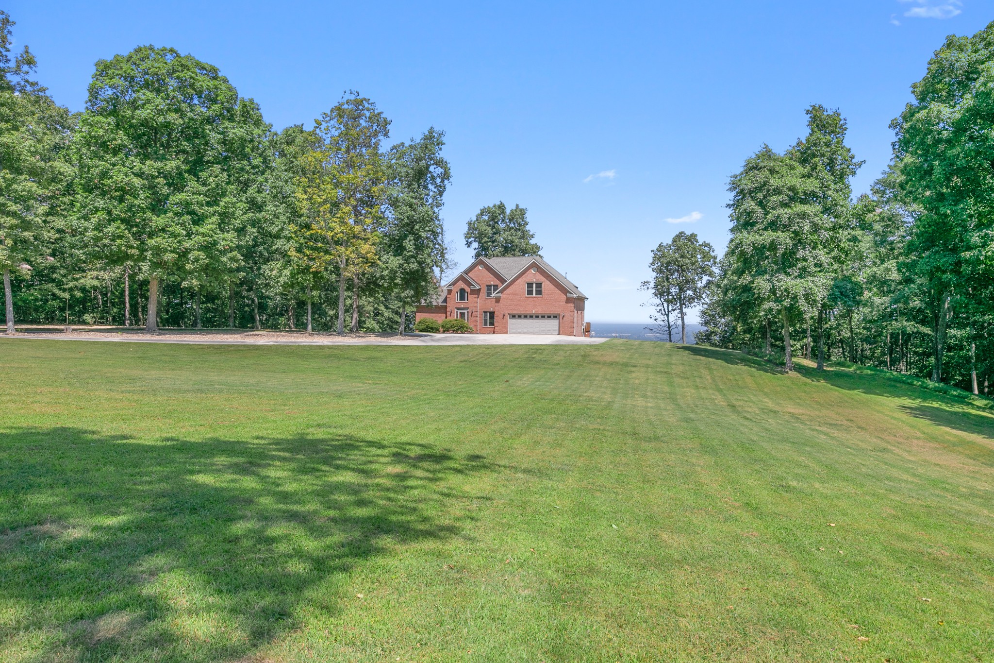 7525 Rowe Gap Road Belvidere, TN 37306 - Photo 13 of 55 a view of a field with a tree in the background