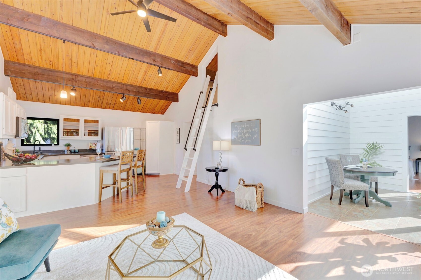 144 Amherst Street Fircrest, WA 98466 - Photo 12 of 39 a living room with furniture and wooden floor