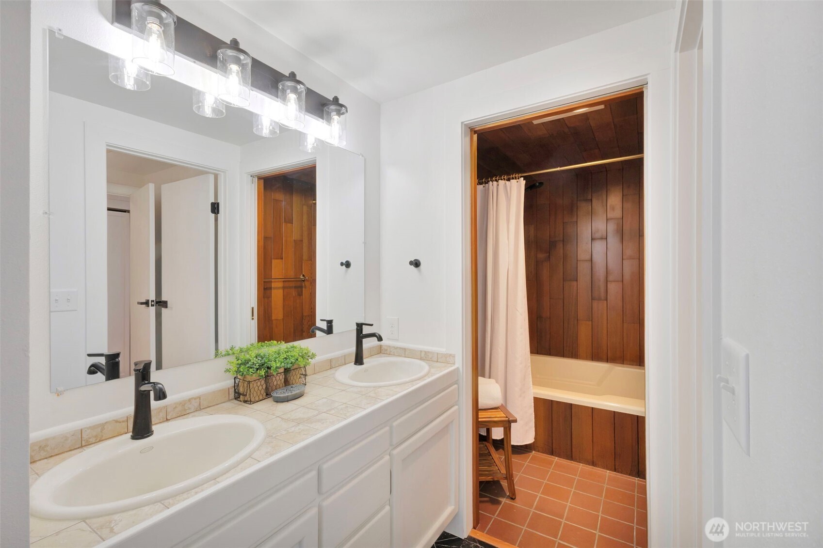 144 Amherst Street Fircrest, WA 98466 - Photo 19 of 39 a bathroom with a sink and a mirror
