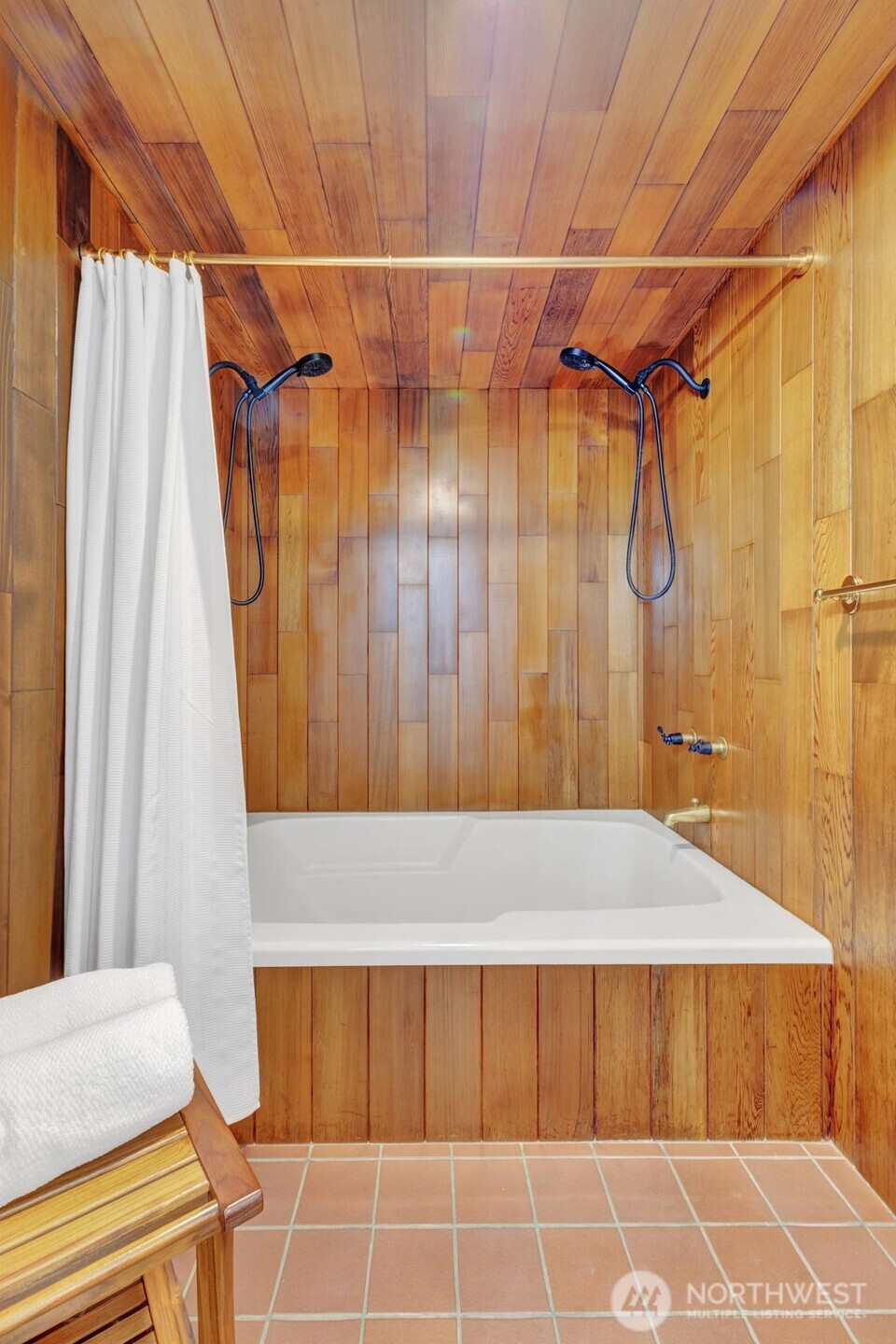 144 Amherst Street Fircrest, WA 98466 - Photo 20 of 39 a bathroom with a shower and a tub